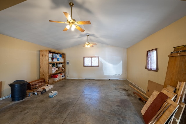 unfurnished living room featuring concrete floors, a ceiling fan, and vaulted ceiling