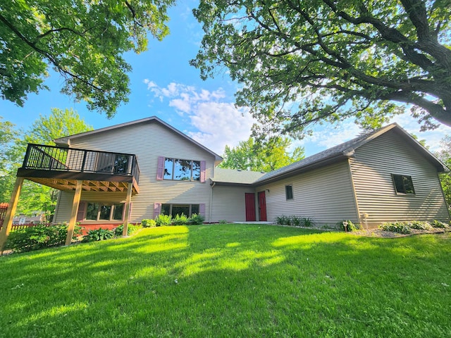 908 Park Ln, Belle Plaine, MN 56011 - back of property featuring a lawn and a deck