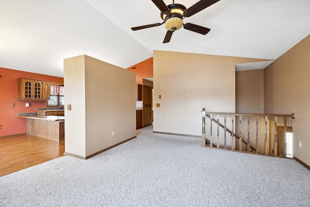 908 Park Ln, Belle Plaine, MN 56011 - spare room with carpet, ceiling fan, and lofted ceiling