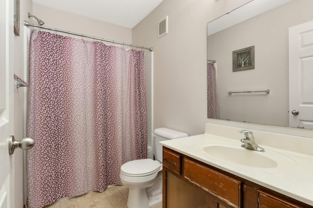 bathroom featuring curtained shower, visible vents, toilet, vanity, and tile patterned flooring