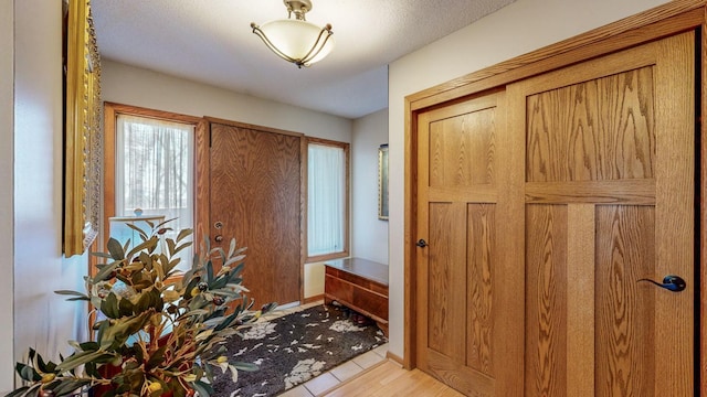 foyer featuring light wood-type flooring