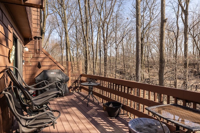 wooden terrace with grilling area