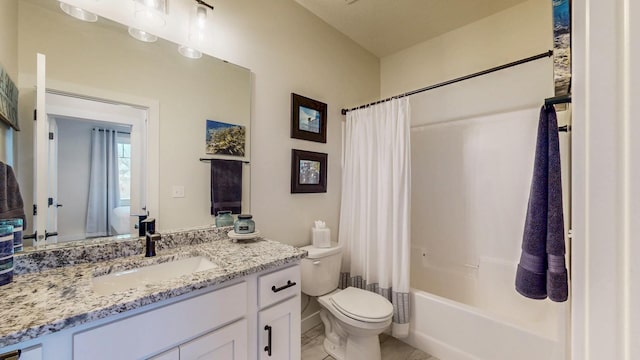 bathroom featuring tile patterned floors, vanity, toilet, and shower / bath combo with shower curtain