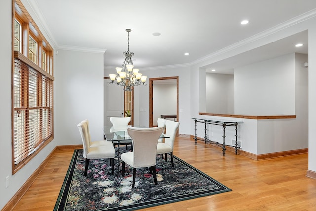 1328 Riverside Ln, Mendota Heights, MN 55118 - dining area featuring a chandelier, baseboards, light wood finished floors, crown molding, and recessed lighting