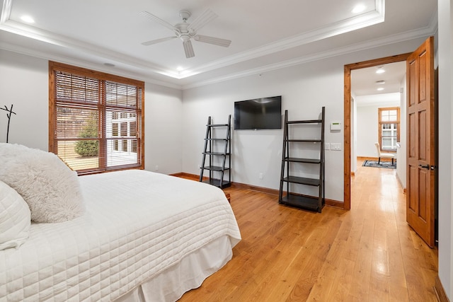 1328 Riverside Ln, Mendota Heights, MN 55118 - bedroom with light wood finished floors, recessed lighting, ornamental molding, baseboards, and a raised ceiling