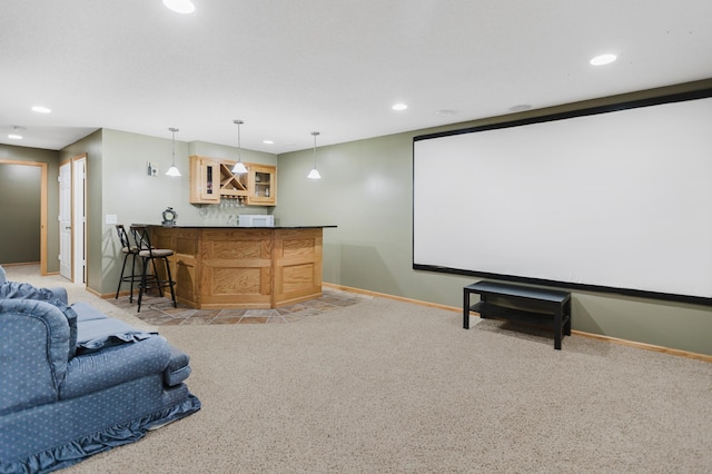 cinema with recessed lighting, a dry bar, and baseboards