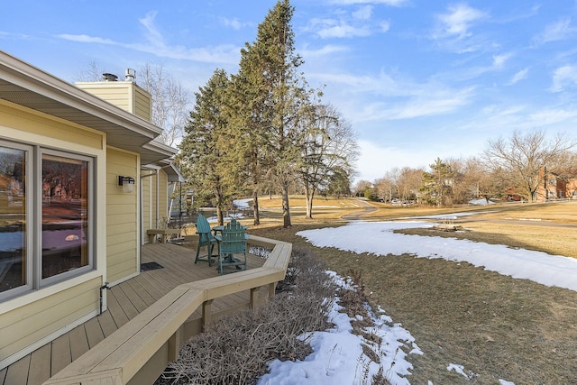 view of snow covered deck