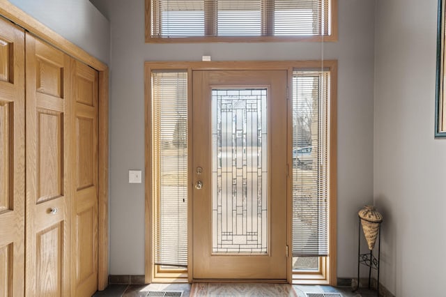 foyer featuring visible vents