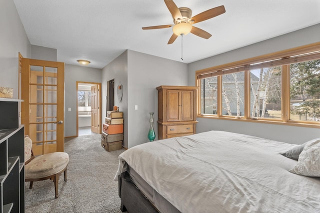 carpeted bedroom featuring a ceiling fan