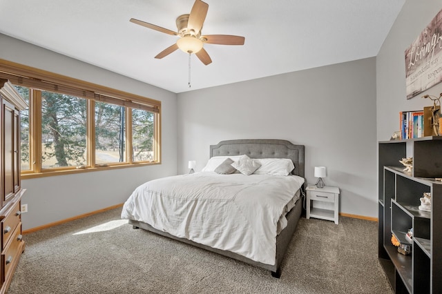 bedroom with baseboards, ceiling fan, and carpet flooring