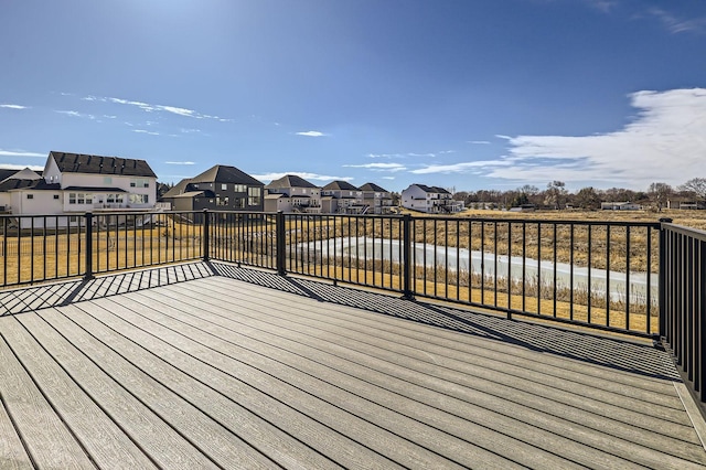 wooden terrace with a residential view