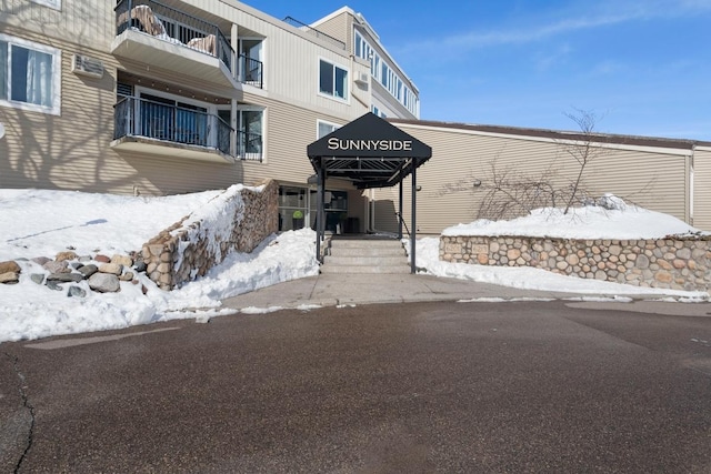 view of snow covered property