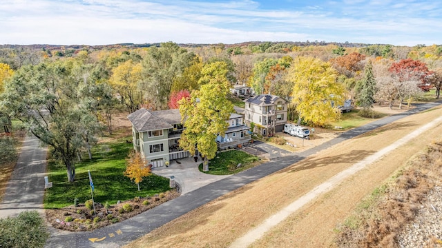 bird's eye view featuring a forest view