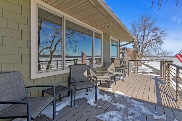view of snow covered deck