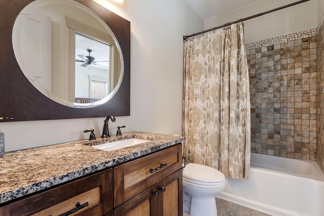 full bath with shower / tub combo, a ceiling fan, vanity, and toilet
