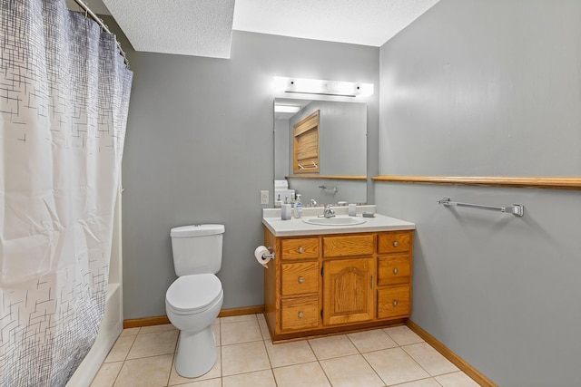 full bathroom featuring toilet, tile patterned flooring, a textured ceiling, and vanity