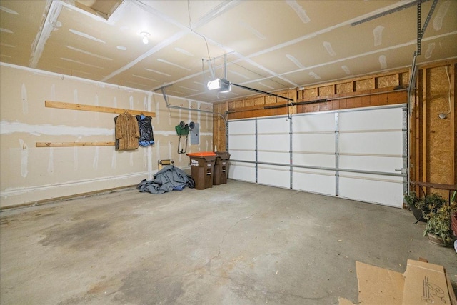 garage featuring a garage door opener