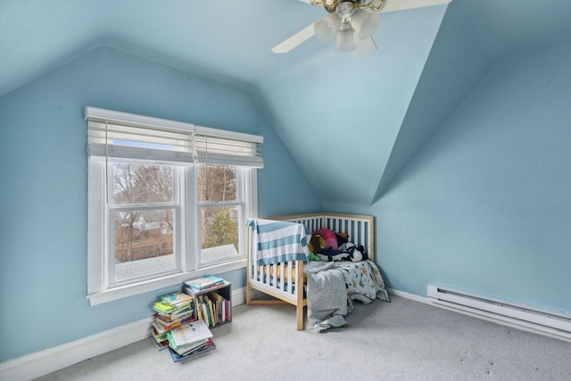 carpeted bedroom with lofted ceiling, baseboard heating, a ceiling fan, and baseboards