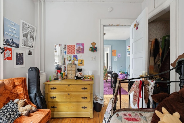 bedroom featuring light wood-style flooring