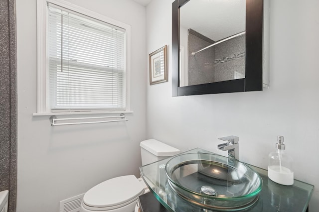 8527 10th Ave S, Bloomington, MN 55420 - bathroom featuring healthy amount of natural light, a shower, and vanity