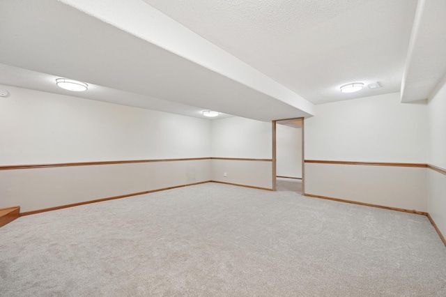 8527 10th Ave S, Bloomington, MN 55420 - finished below grade area featuring carpet and baseboards