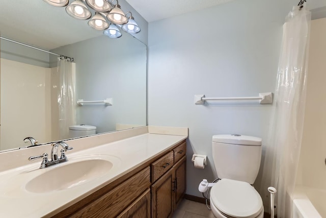 full bathroom with vanity, toilet, and tile patterned floors