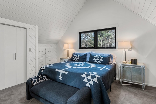 bedroom featuring lofted ceiling, carpet, and wooden ceiling