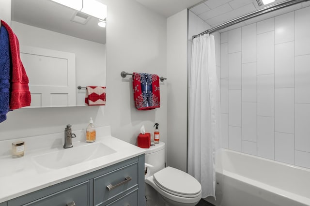 bathroom with toilet, visible vents, shower / bath combination with curtain, and vanity