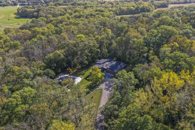 aerial view with a wooded view