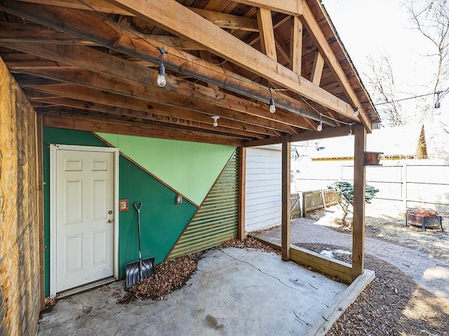 view of patio featuring fence