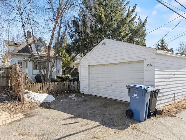 detached garage with fence