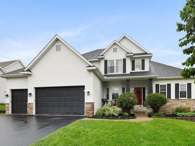 1757 Sandbar Cir, Waconia, MN 55387 - view of front of property with stone siding, driveway, a front yard, a garage, and a shingled roof