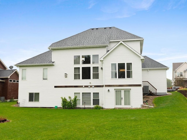 1757 Sandbar Cir, Waconia, MN 55387 - back of house with a yard and a shingled roof