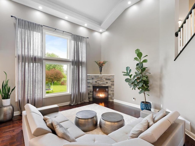 1757 Sandbar Cir, Waconia, MN 55387 - living room featuring wood finished floors, a stone fireplace, stairway, recessed lighting, and baseboards
