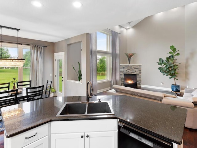 1757 Sandbar Cir, Waconia, MN 55387 - kitchen with a sink, open floor plan, black dishwasher, plenty of natural light, and recessed lighting