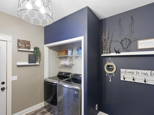 1757 Sandbar Cir, Waconia, MN 55387 - laundry room with washer and dryer, baseboards, and wood finished floors