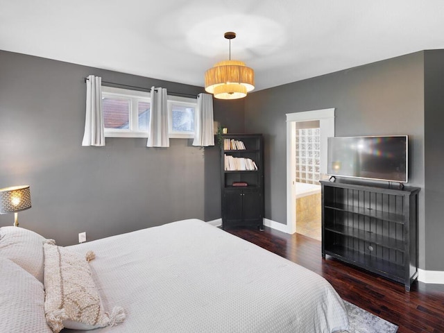 1757 Sandbar Cir, Waconia, MN 55387 - bedroom with wood finished floors, multiple windows, and baseboards