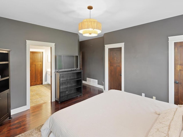 1757 Sandbar Cir, Waconia, MN 55387 - bedroom featuring wood finished floors and baseboards