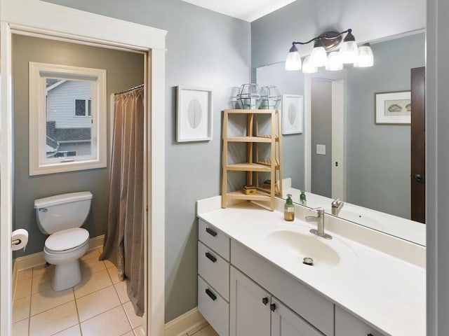 1757 Sandbar Cir, Waconia, MN 55387 - bathroom with toilet, tile patterned floors, baseboards, and vanity