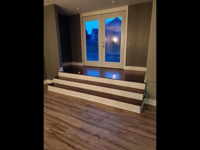 1757 Sandbar Cir, Waconia, MN 55387 - spare room featuring french doors, wood finished floors, baseboards, and recessed lighting