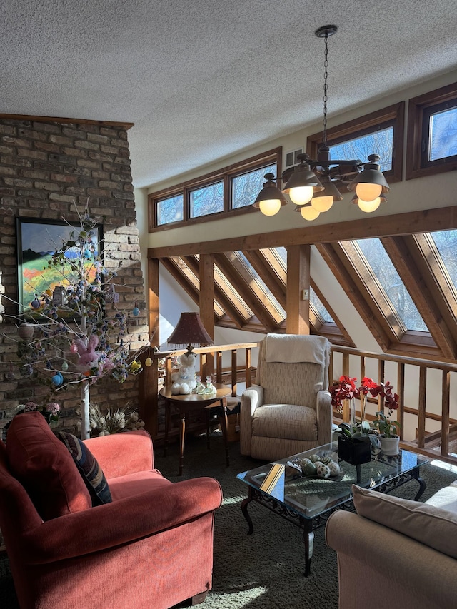 living area with carpet floors, vaulted ceiling with skylight, and a textured ceiling