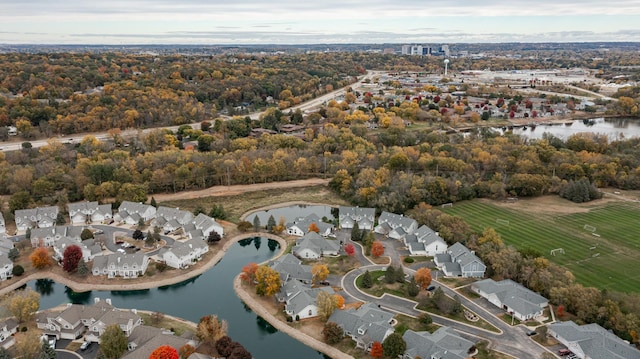 1868 Tiffany Cove Ln SW, Rochester, MN 55902 - aerial view of property and surrounding area with a large body of water and nearby suburban area