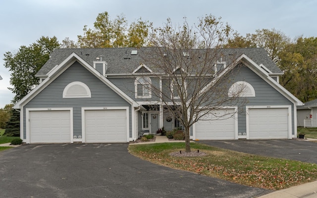 1868 Tiffany Cove Ln SW, Rochester, MN 55902 - view of front facade with driveway and roof with shingles