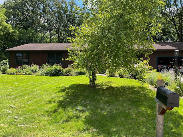 view of yard with an attached garage