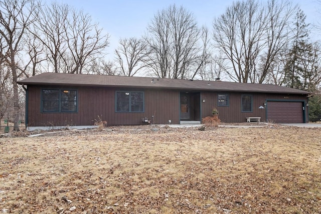 ranch-style home with an attached garage