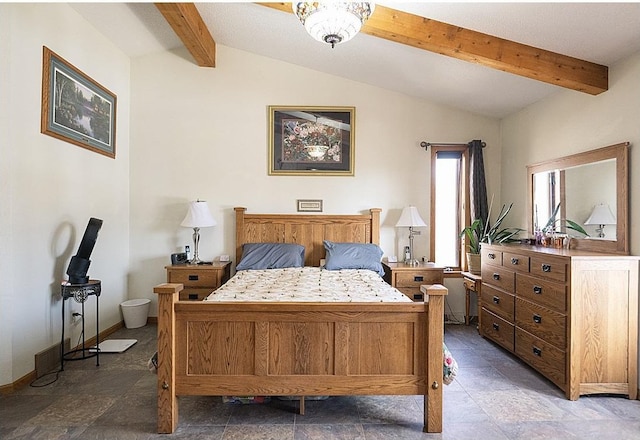 bedroom with stone finish floor, vaulted ceiling with beams, and baseboards