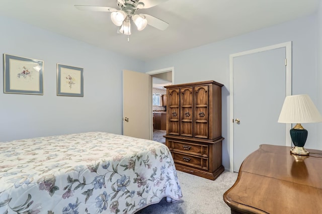 carpeted bedroom featuring a ceiling fan
