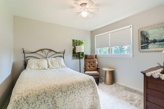 bedroom with carpet flooring, ceiling fan, and baseboards