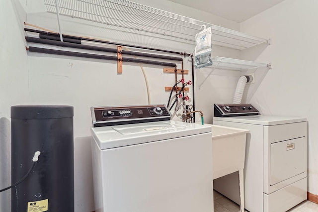 laundry area with washer and dryer and laundry area