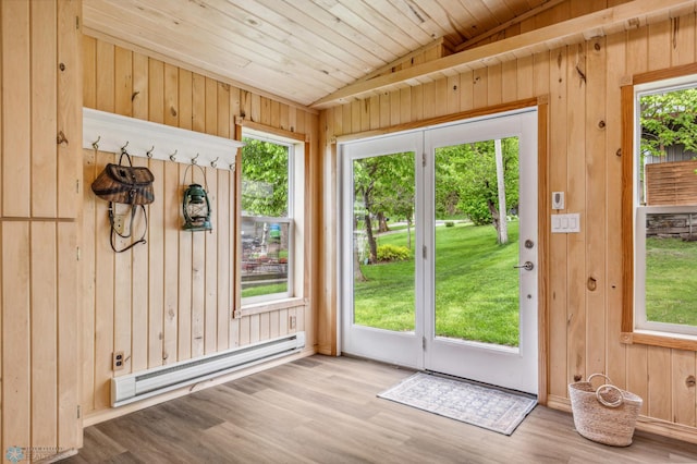 entryway featuring wooden ceiling, wood walls, wood finished floors, vaulted ceiling, and baseboard heating